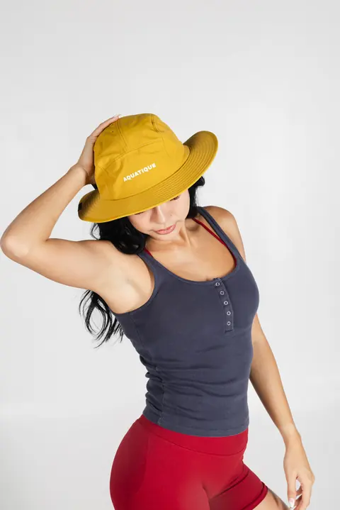 AQUATIQUE Mustard bucket hat, worn in the studio
