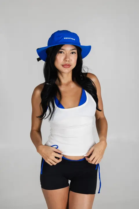 AQUATIQUE Navy bucket hat, worn in the studio