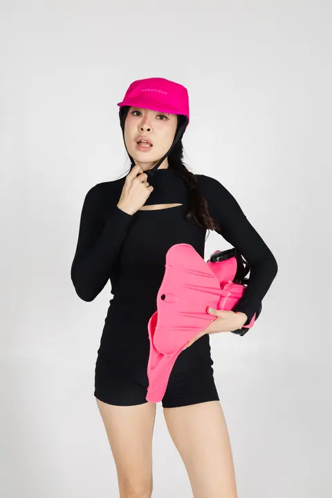 AQUATIQUE Shock Pink cap, worn in the studio