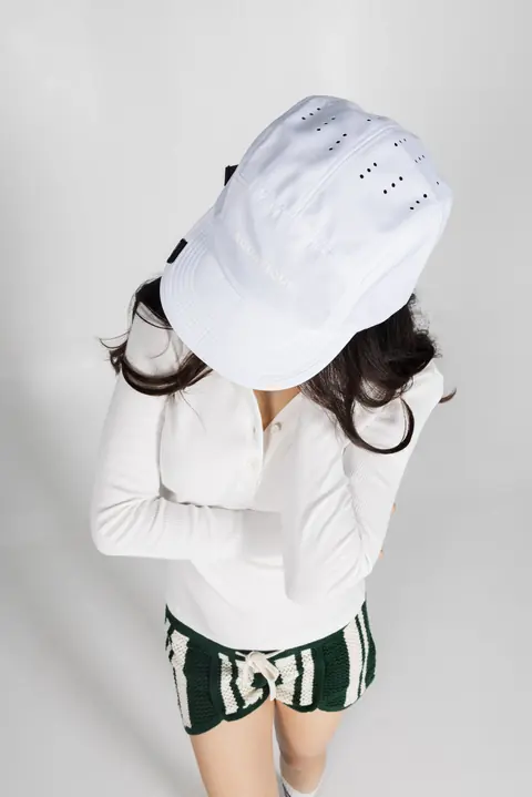AQUATIQUE White cap, worn in the studio